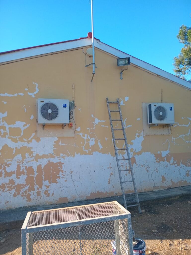 Sides of the building before paint makeover (1)